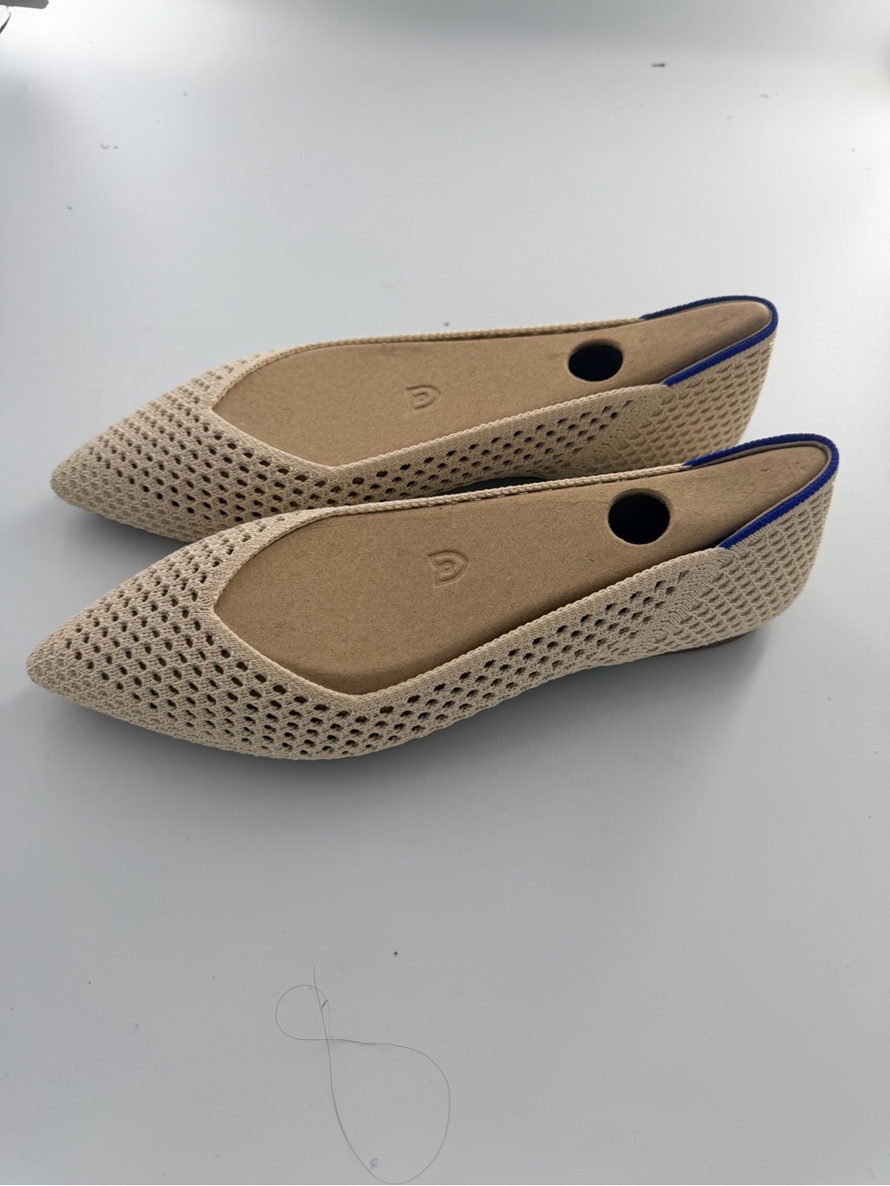 Rothy's Pointed Knit Flats in Beige with Blue Accent